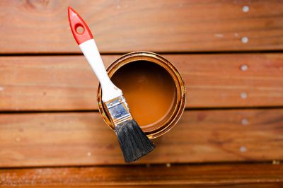 Shields wood from moisture, UV rays, and wear, preventing rot